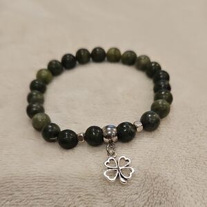Elegant Green Bracelet with Silver Clover Charm